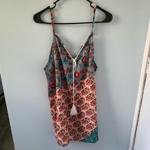 Long sleeveless blouse